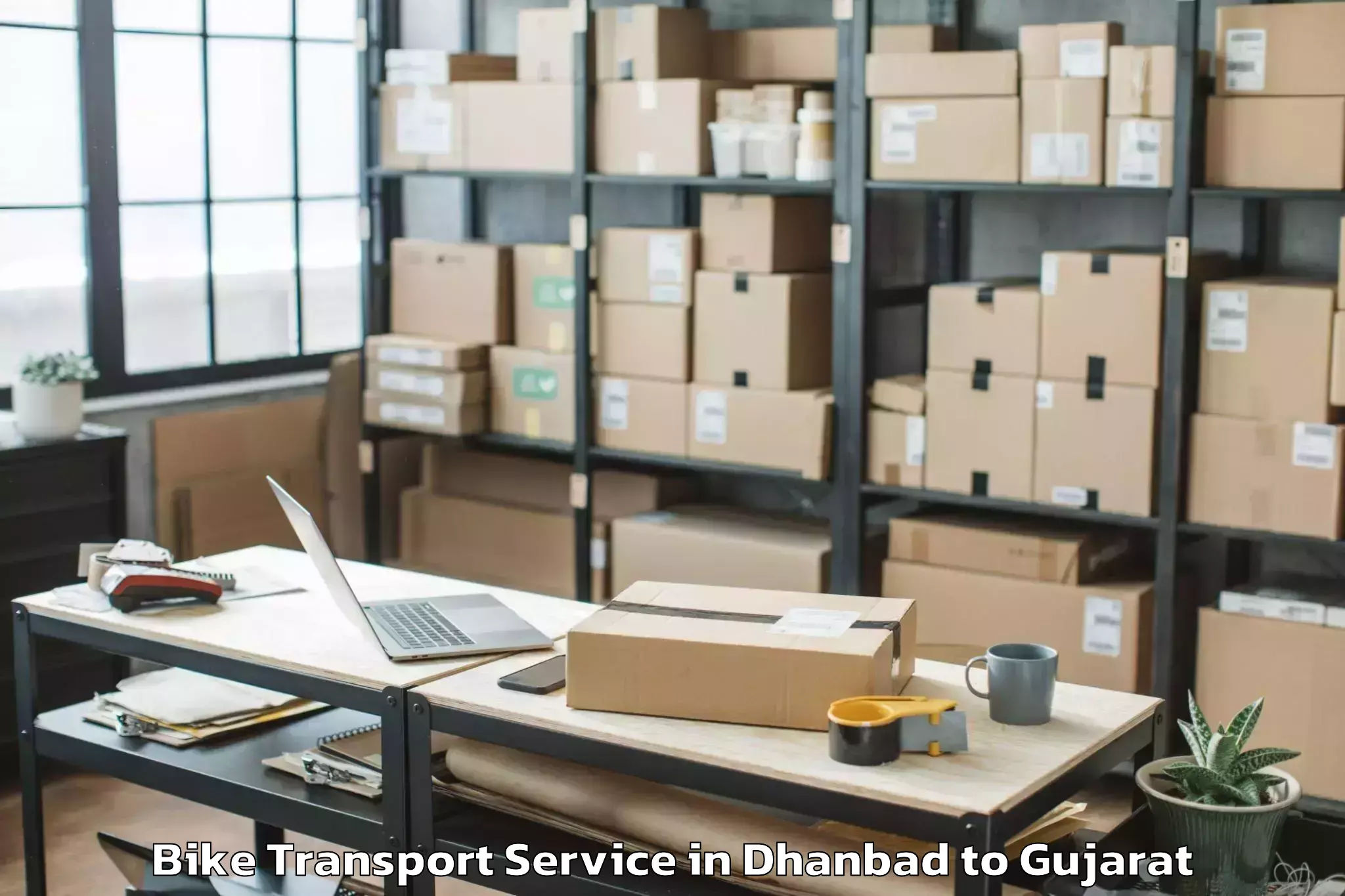 Leading Dhanbad to Jamnagar Bike Transport Provider